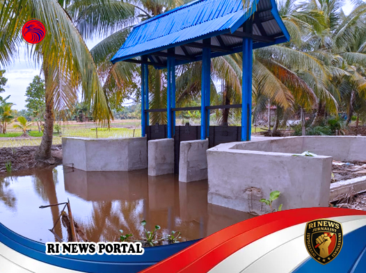 Pembangunan Pintu Air Irigasi di Dusun Sungai Palai